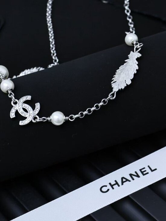 CHANEL Crystal CC Long Pearl Necklace SHW - Timeless Luxuries Chanel Silver-Tone Pearl & Crystal Feather CC Necklace
